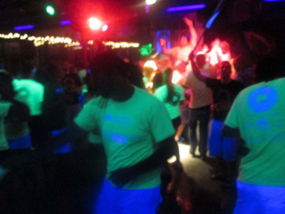 Our shirts changed colors in the lights upstairs at Gemstones!